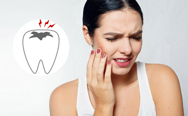 Răng bị ê buốt do nghiến răng khi ăn